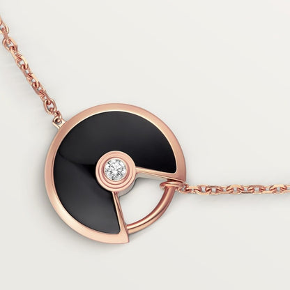 CARTIER CURB CHAIN BLACK ONYX ROSE GOLD AMULET
